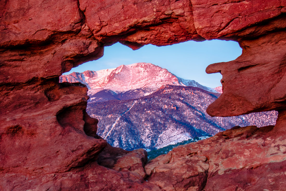 Pikes Peak framed by the sandstone in Garden Of The Gods, Colorado Springs