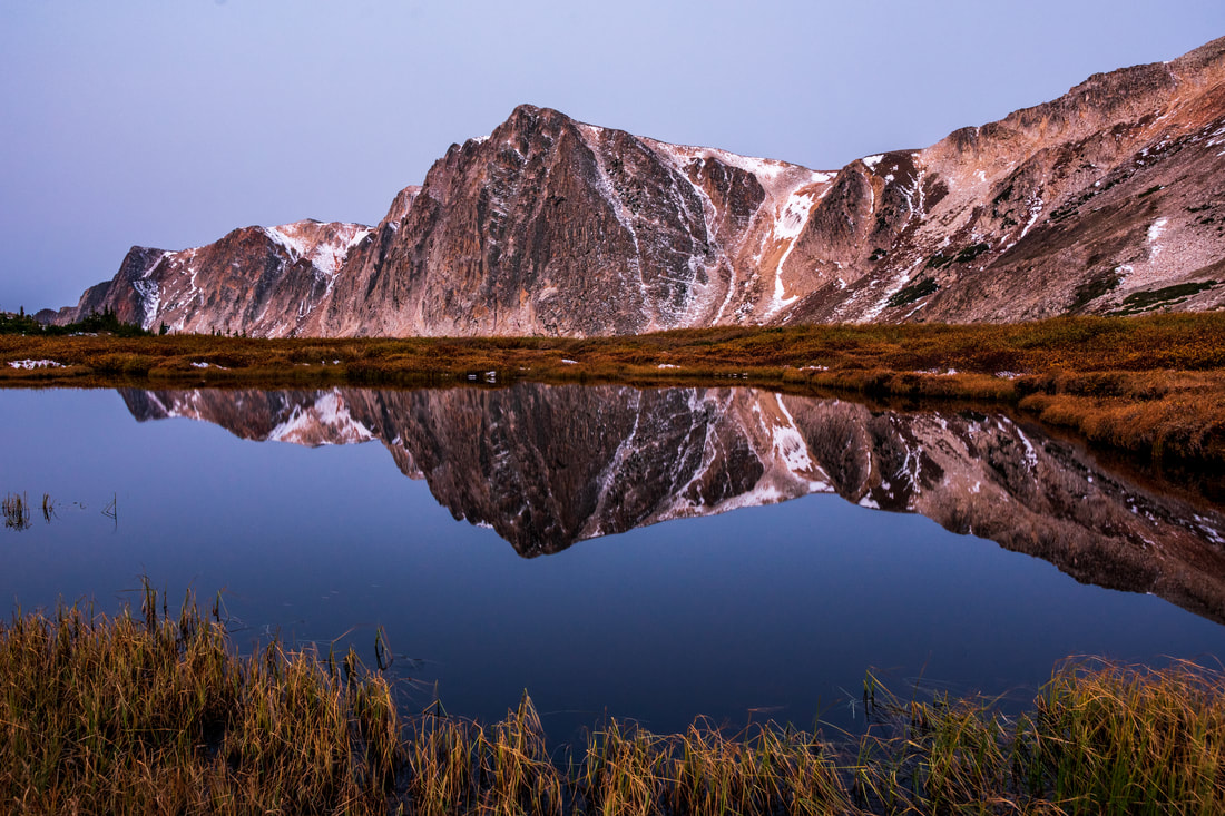 Reflection in a small pond in the Snowy Range Mountains Wyoming