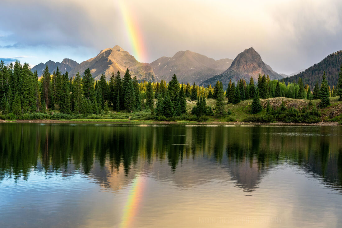 Rainbow over Molas Lake near Silverton Colorado at sunset